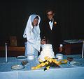 0130-Marci, Ron, cutting cake, June 5, 1970